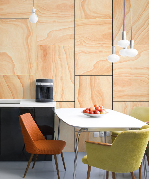 Ply Wood Wallpaper • Light Brown Wallpaper • Wood Grain Wallpaper insitu with an orange chair and a green chair around a white table