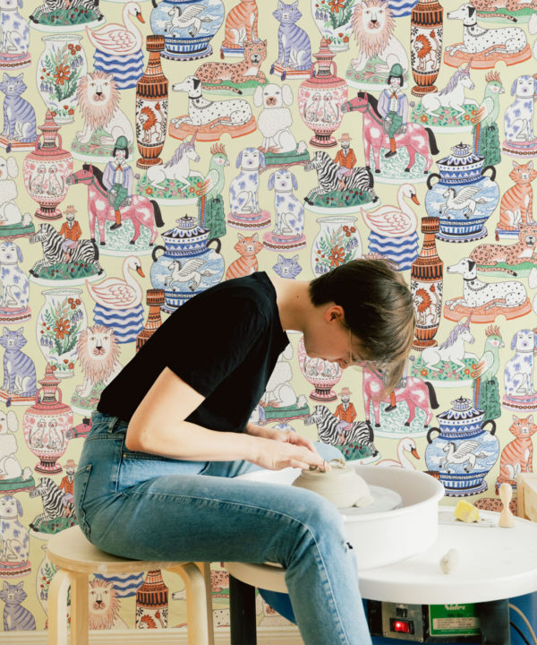 Ceramics Wallpaper featuring vases of dogs, cats, zebras, lions, parrots and unicorns insitu